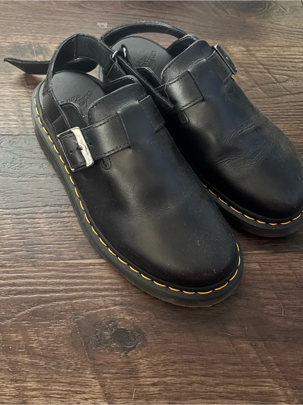 Dr. Martens Black Leather Buckle Clogs with Yellow Welt Stitching